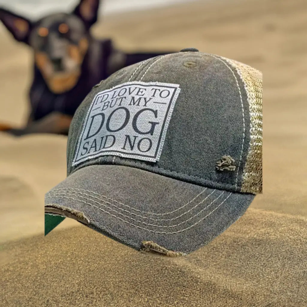 'I'd love to but my dog said no' distressed trucker ball cap